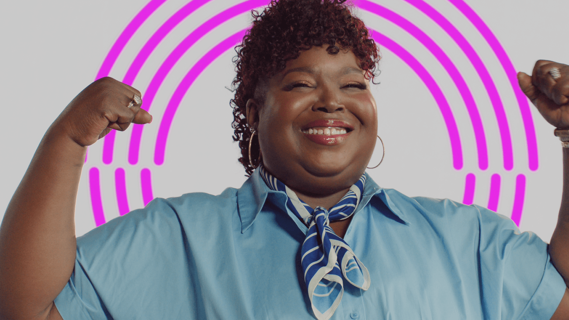 Portrait of Atiba smiling with magenta arcs around her, featured in the Won't Lose Voices series